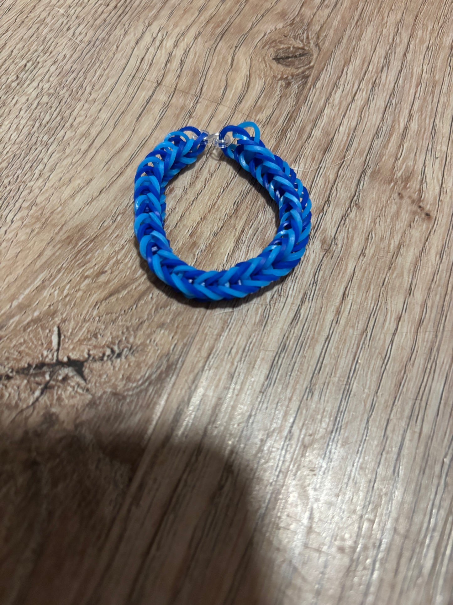 Light blue and dark blue rubber bands bracelets