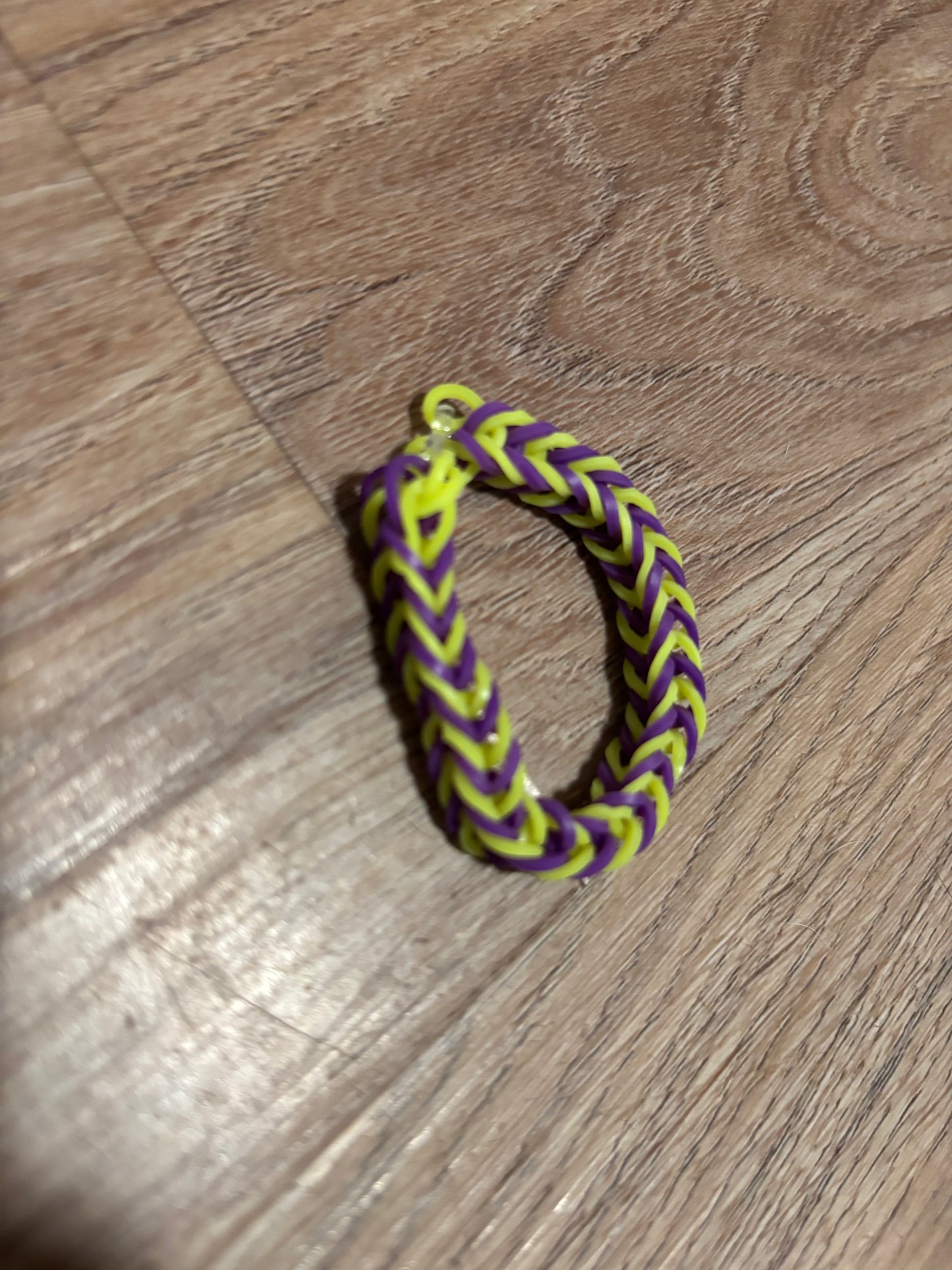Yellow and purple rubber bands bracelets