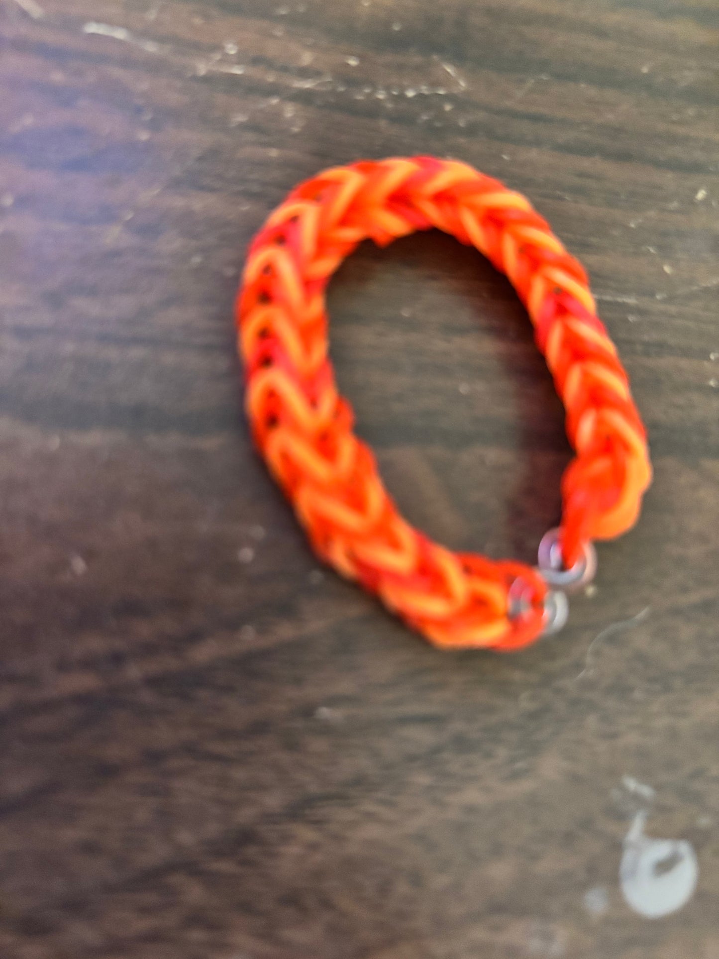 Red and orange rubber band bracelets