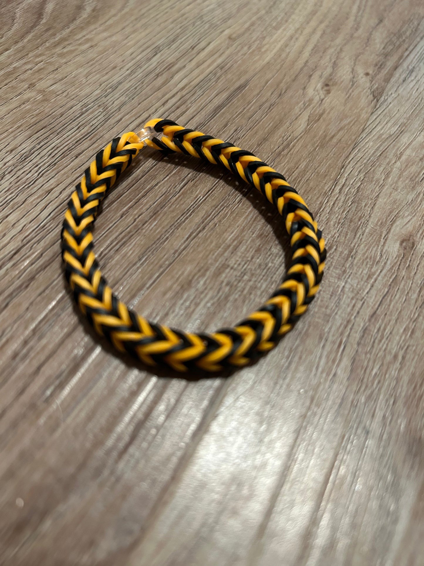 Orange and black rubber bands bracelets