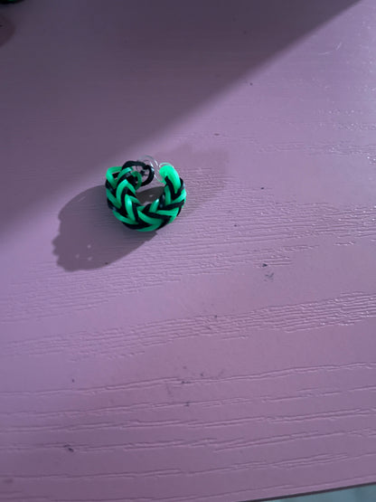 Green and black rubber band rings