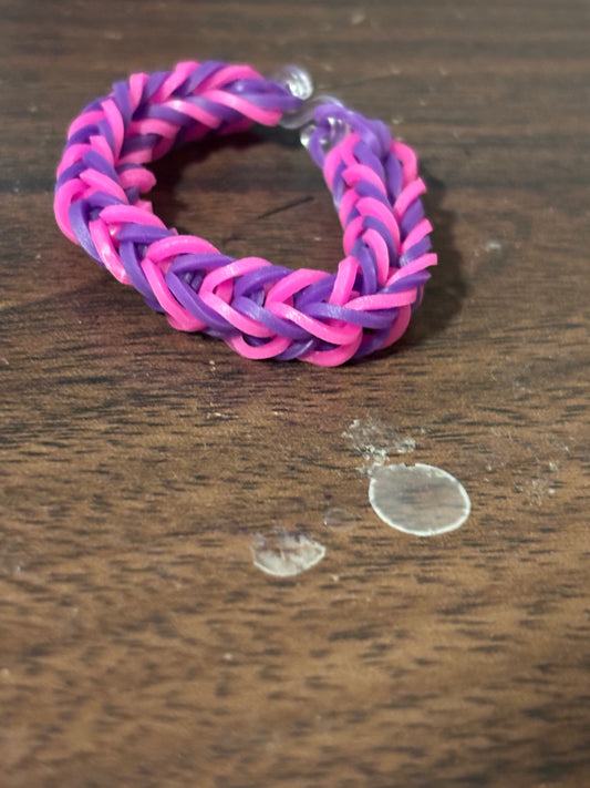 Hot pink and purple rubber band bracelets