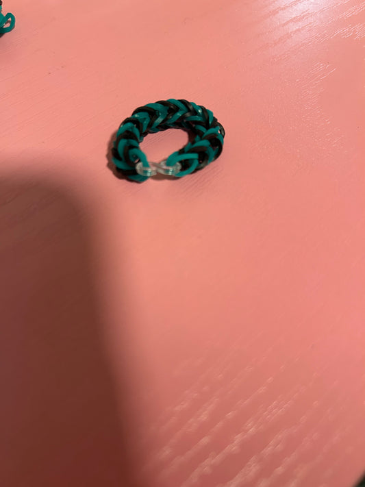 Dark green and black rubber band rings