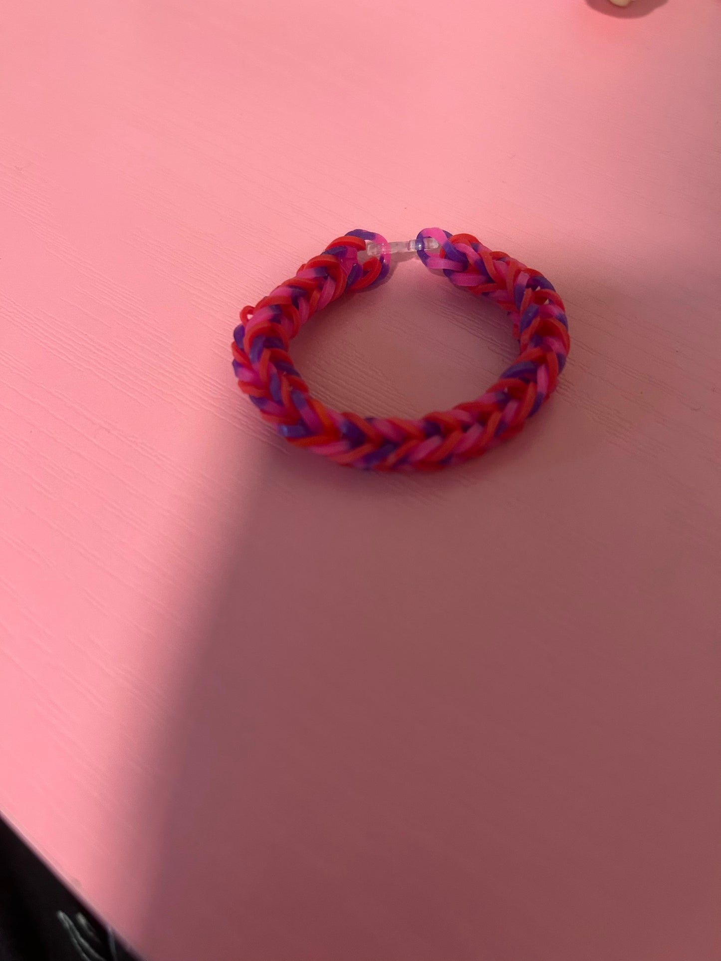 Red and pink/purple pattern rubber band bracelets